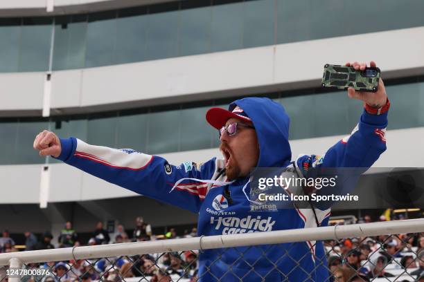 Fan reacts to on track action during the NASCAR Cup Series Pennzoil 400 presented by Jiffy Lube Sunday, March 5 at the Las Vegas Motor Speedway in...