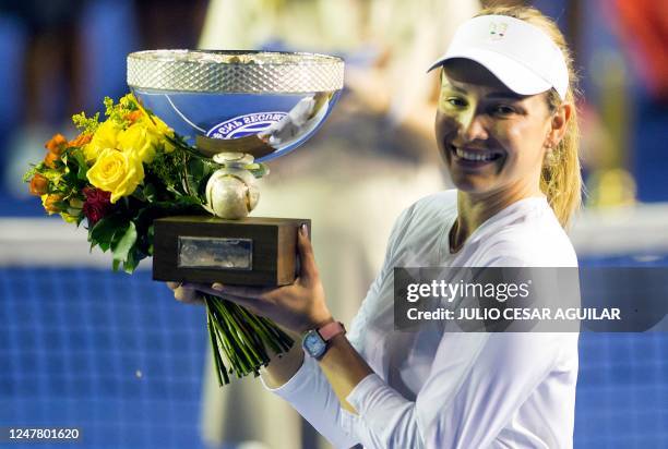 Croatia's tennis player Donna Vekic poses with the trophy after winning the Monterrey WTA Open final match against Frances Caroline Garcia in...