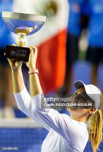 Croatia's tennis player Donna Vekic poses with the trophy after winning the Monterrey WTA Open final match against Frances Caroline Garcia in...