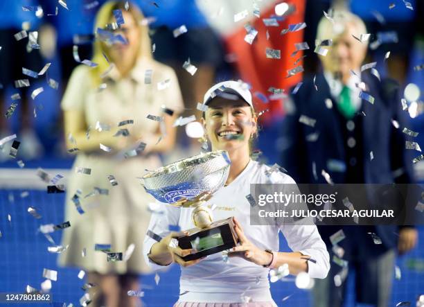 Croatia's tennis player Donna Vekic poses with the trophy after winning the Monterrey WTA Open final match against Frances Caroline Garcia in...