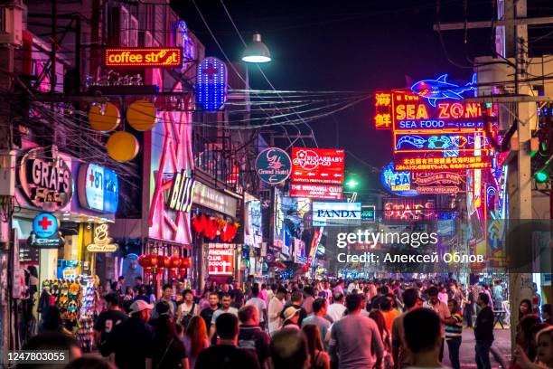 pattaya,thailand - january 27,2019: crowd are walking through the walking street in pattaya,thailand. - pattaya fotografías e imágenes de stock