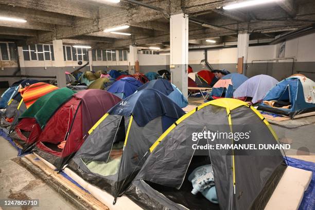 This photograph taken on March 1 shows tents for people in administrative difficulties, including undocumented and migrants and asylum seekers,...