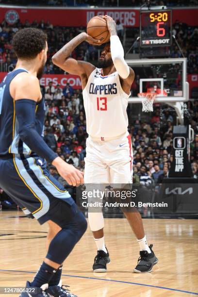 Paul George of the LA Clippers shoots a three point basket during the game against the Memphis Grizzlies on March 5, 2023 at Crypto.Com Arena in Los...