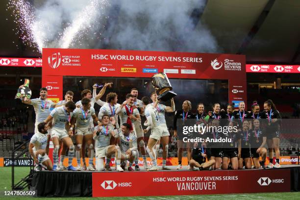 Players of Argentina and New Zealand pose on the podium after the final game of the World Rugby Seven Series 2023 BC Place Stadium in Vancouver,...