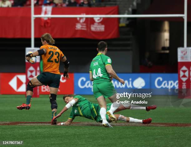 Players in action during the bronze medal match of the World Rugby Seven Series 2023 between Ireland and Australia at BC Place Stadium in Vancouver,...