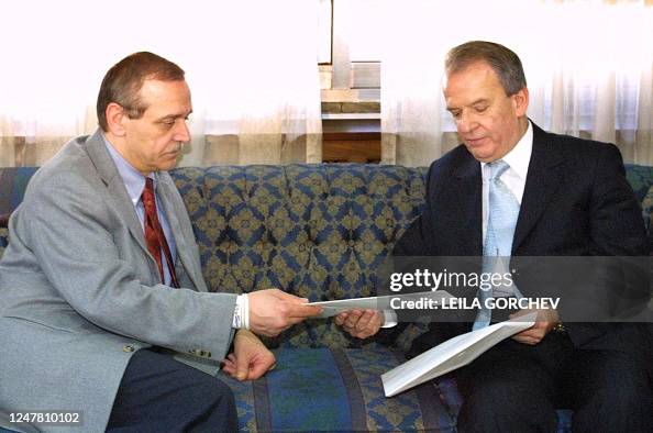 Palestinian Minister of Information Yasser Abed Rabbo receives from