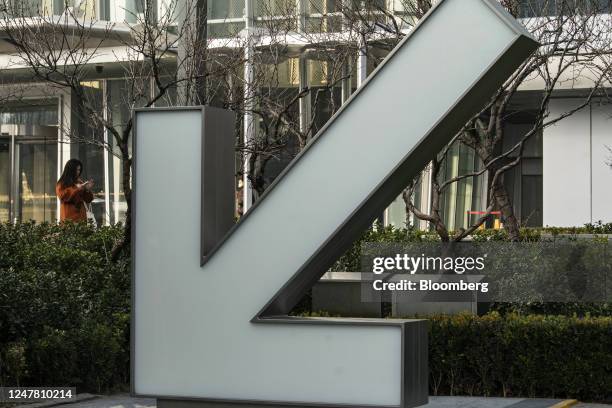 An arrow sign in Beijing, China, on Monday, March 6, 2023. China set a modest economic growth target of around 5% for the year, with the nations top...