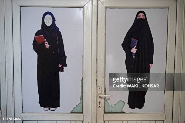 Poster pasted on a door ordering women to cover themselves with a Hijab is pictured at a private university after the universities were reopened in...
