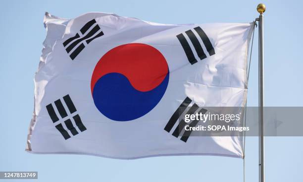 The South Korean flag also known as the Taegukgi is seen flying in Dongdaemun Design Plaza in Seoul.