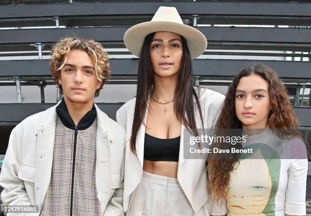 Camila Alves McConaughey poses with children Levi Alves McConaughey and Vida Alves McConaughey at the Stella McCartney Womenswear Fall Winter...