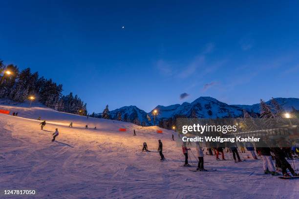 People night skiing at Sundance Resort, also known as Sundance Mountain Resort, which is a ski resort located 13 miles northeast of Provo, Utah, USA.