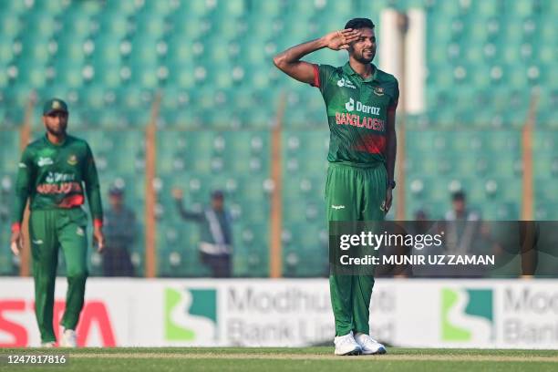 Bangladesh's Ebadot Hossain gestures as he celebrates after the dismissal of England's Dawid Malan during the third one-day international cricket...