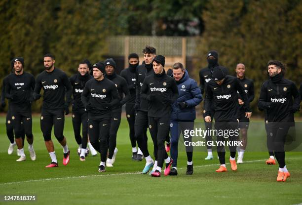 Chelsea players attend a team training session at Chelsea's Cobham training facility in Stoke D'Abernon, southwest of London on March 6, 2023 on the...