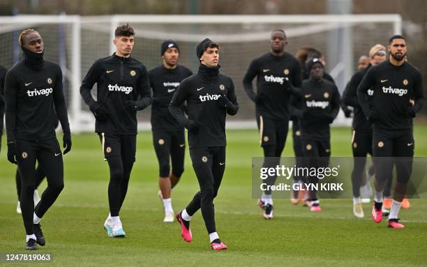 Chelsea's Portuguese striker Joao Felix attends a team training session at Chelsea's Cobham training facility in Stoke D'Abernon, southwest of London...