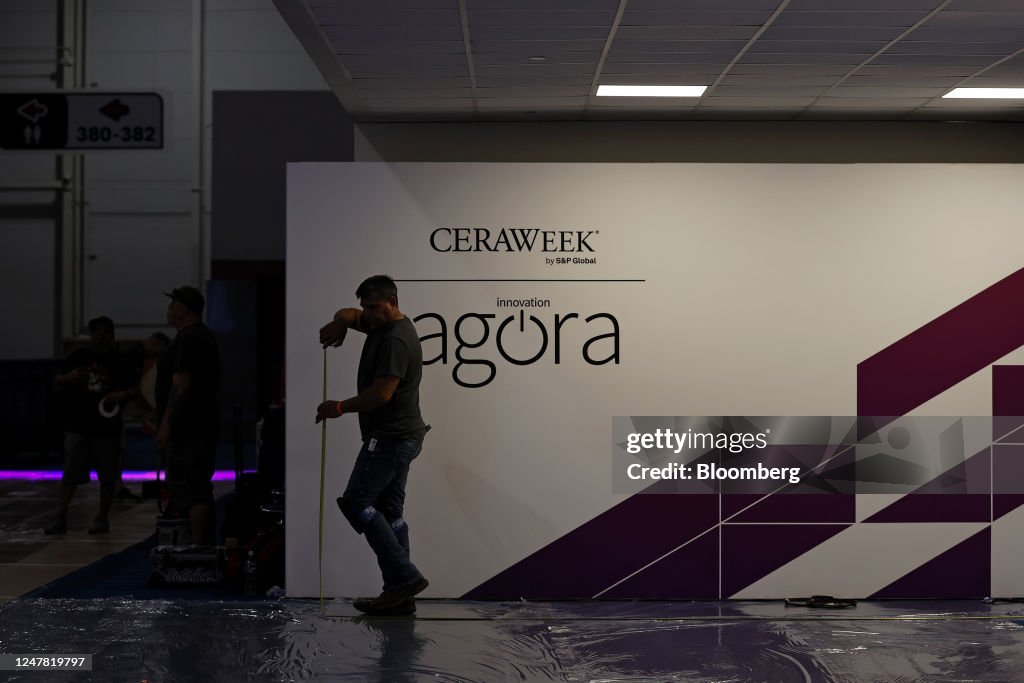 Interpass Ceraweek A worker ahead of the 2023 CERAWeek by S&P Global conference in... News ...