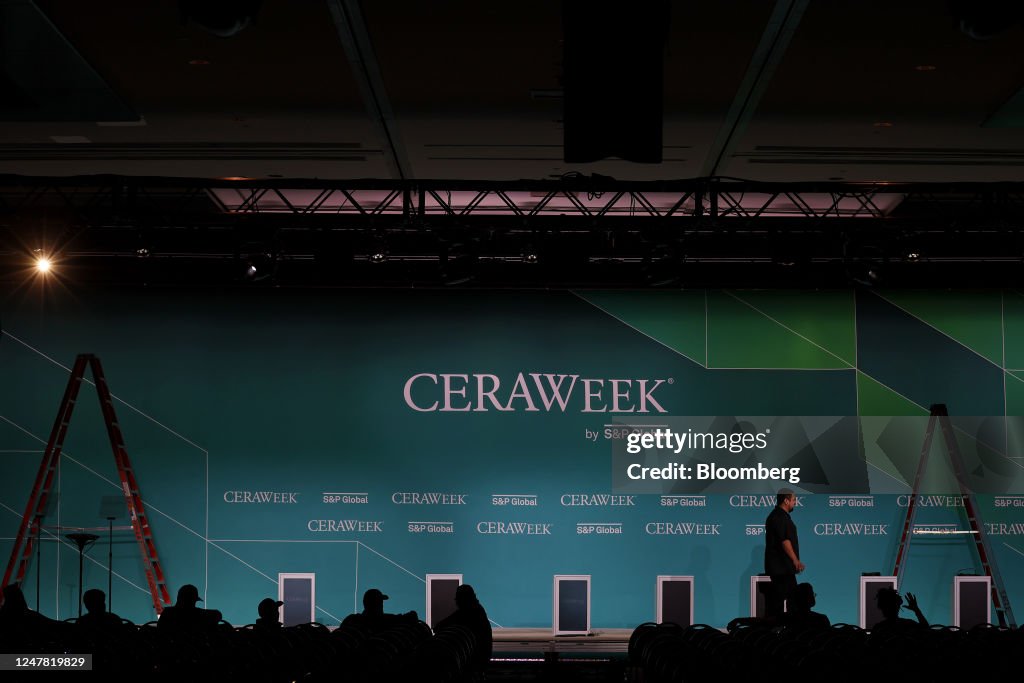 Interpass Ceraweek A worker ahead of the 2023 CERAWeek by S&P Global conference in... News ...