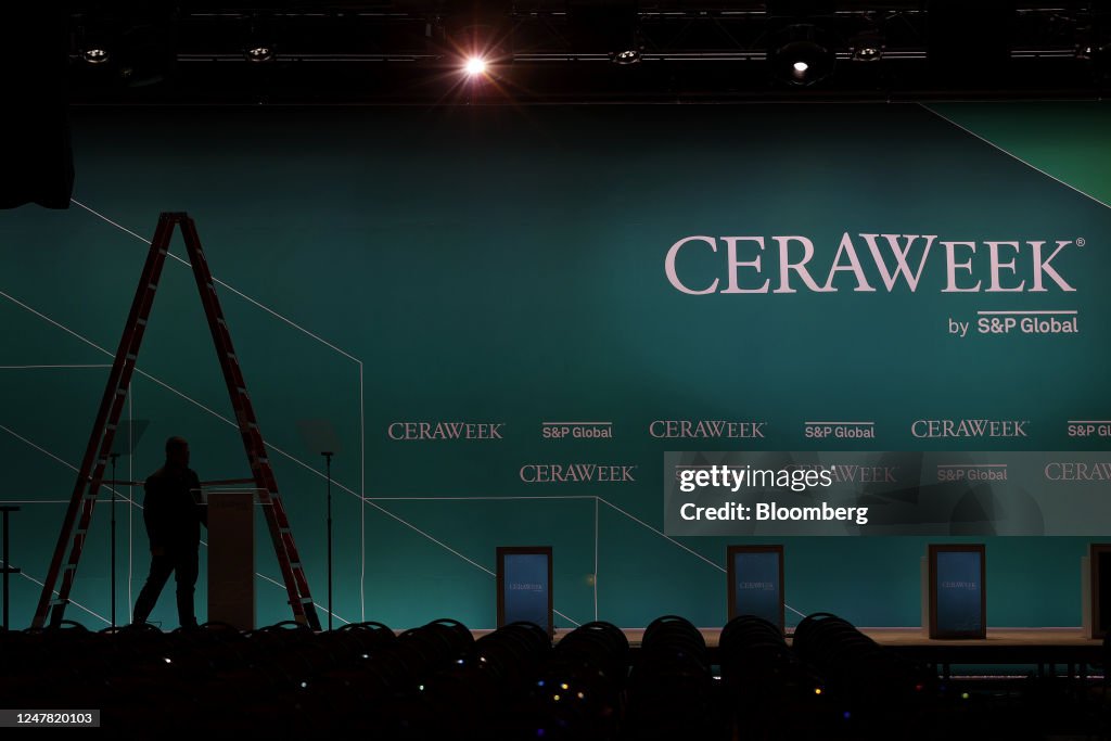 Interpass Ceraweek A worker ahead of the 2023 CERAWeek by S&P Global conference in... News ...