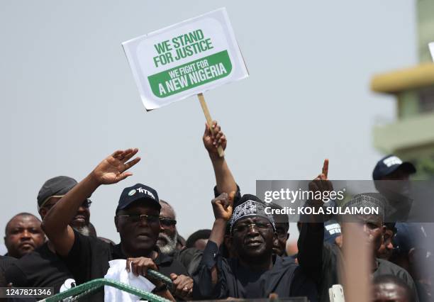 Candidate of Nigerias Peoples Democratic Party, Atiku Abubakar leads supporters to protest at Independent National Electoral Commission headquarters,...