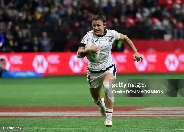 USAs Nicole Heavirland runs for a try against France during the annual HSBC Canada Rugby Sevens tournament in Vancouver, Canada, on March 5, 2023.