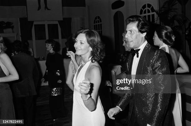 Photo taken on september 2, 1975 shows French actress Michèle Mercier and her husband Claude Bourillot dancing during the 1st edition of the...