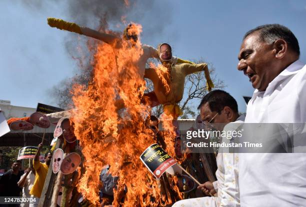 Delhi BJP Working President Virendra Sachdeva and LOP Ramvir Singh Bidhuri along with Party workers burning HOLI Bonfire of Corruption of Arvind...