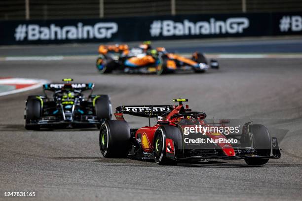 Carlos Sainz of Spain, Scuderia Ferrari, SF-23 - Ferrari, action 44 Lewis Hamilton of United Kingdom, Mercedes - AMG PETRONAS, W14 - Mercedes, action...