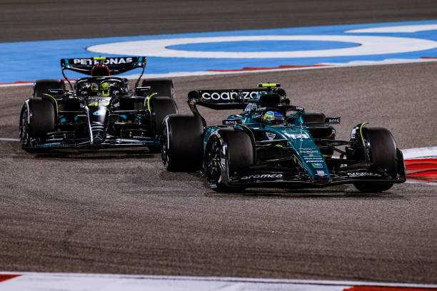 Fernando Alonso overtakes Lewis Hamilton