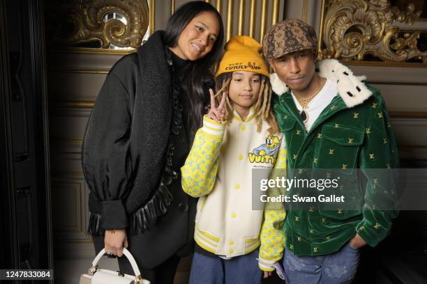 Helen Lasichanh, Rocket Ayer Williams and Pharrell Williams at Louis Vuitton Fall 2023 Ready To Wear Runway Show on March 6, 2023 at the Musee dOrsay...