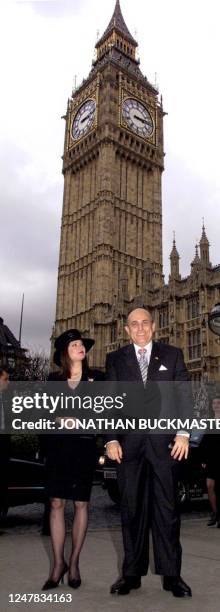 Former Mayor of New York city Rudolph Giuliani and partner Judith Nathan pose for photographer upon arrival outside The House of Commons for Prime...
