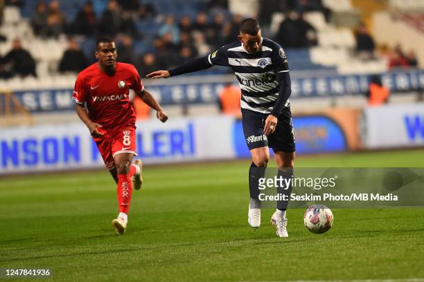 Valentin Eysseric of Kasimpasa and Fernando Lucas Martins of Antalyaspor battle for the ball during the Super Lig match between Kasimpasa SK and...