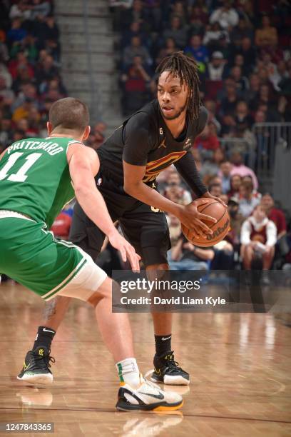 Darius Garland of the Cleveland Cavaliers dribbles the ball during the game against the Boston Celtics on March 6, 2023 at Rocket Mortgage FieldHouse...