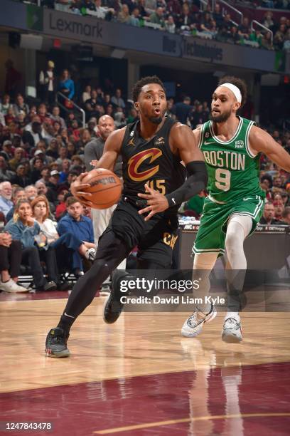 Donovan Mitchell of the Cleveland Cavaliers drives to the basket during the game against the Boston Celtics on March 6, 2023 at Rocket Mortgage...