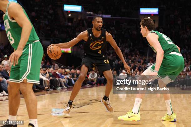 Evan Mobley of the Cleveland Cavaliers. Dribbles the ball during the game against the Boston Celtics on March 6, 2023 at Rocket Mortgage FieldHouse...