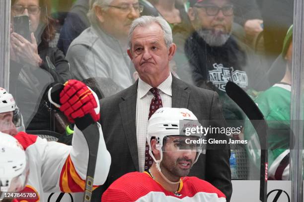 Darryl Sutter of the Calgary Flames coaches against the Dallas Stars at the American Airlines Center on March 6, 2023 in Dallas, Texas.