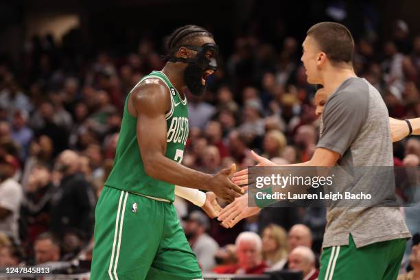 Jaylen Brown of the Boston Celtics celebrates during the game against the Cleveland Cavaliers on March 6, 2023 at Rocket Mortgage FieldHouse in...