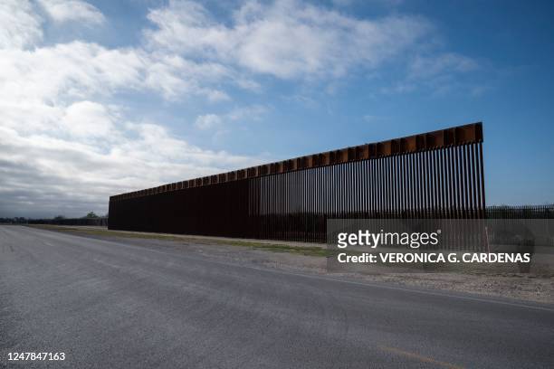Segment of the new border wall is seen in front of the older border wall in Del Rio, Texas on March 5, 2023.