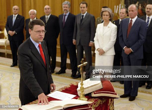 Newly-named Spanish Public Administration Minister Jordi Sevilla swears in, as Spain's King Juan Carlos, Queen Sofia, new elected Prime Minister Jose...