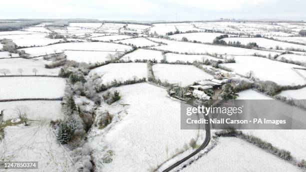 Snow blankets the townland of Ardateggle in County Laois in the Republic of Ireland, as a cold front passes over the UK and Ireland. Picture date:...