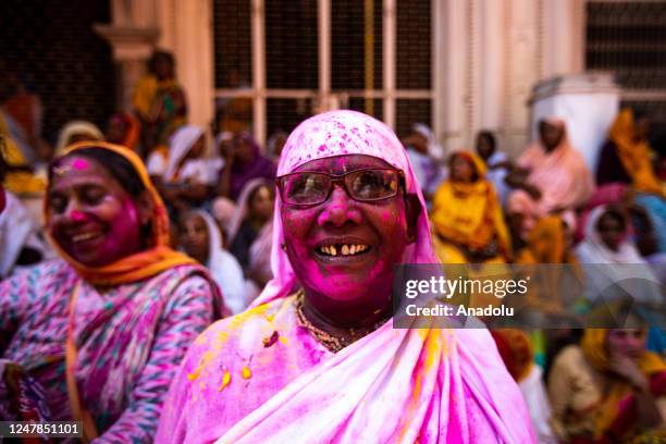 Widows shower flower petals as they celebrate Holi, the Hindu spring festival of colours at a temple, in Vrindavan, Uttar Pradesh, India on March 6,...