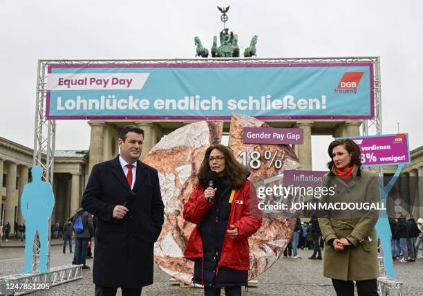 German Minister of Labour and Social Affairs Hubertus Heil, DGB chairwoman Yasmin Fahimi and the federal commissioner for Anti-Discrimination Ferda...