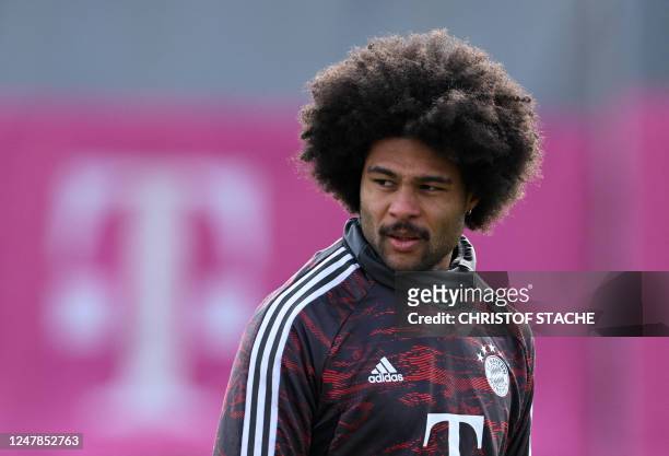 Bayern Munich's German midfielder Serge Gnabry takes part in a training session of his players on the eve of the UEFA Champions League round of 16,...