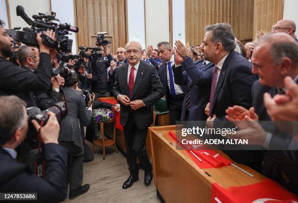 Chairman of Turkey's main opposition Republican People's Party Kemal Kilicdaroglu arrives at the parliament for his group speech in Ankara on March...