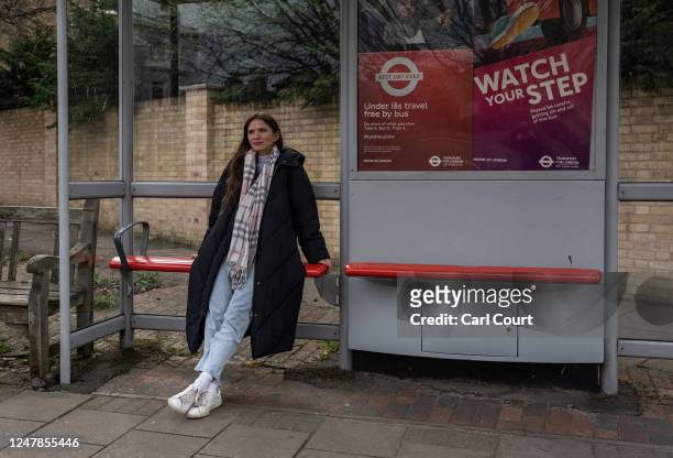 Ukrainian refugee Yevhenia Shymshyrian waits for a bus after working at a school in Richmond on March 6, 2023 in London, England. Shymshyrian, a...