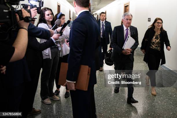 Jerome Powell, chairman of the US Federal Reserve, center right, arrives before a Senate Banking, Housing, and Urban Affairs Committee hearing in...