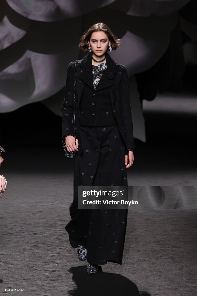 a-model-walks-the-runway-during-the-chanel-womenswear-fall-winter-2023-2024-show-as-part-of.jpg