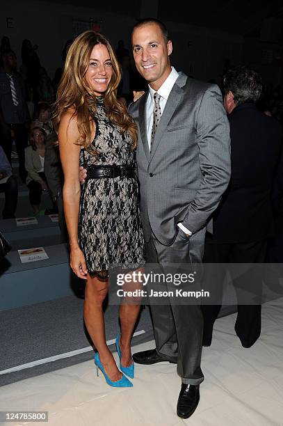 Model Kelly Bensimon and photographer Nigel Barker attend the Perry Ellis Spring 2012 fashion show during Mercedes-Benz Fashion Week at The Stage at...