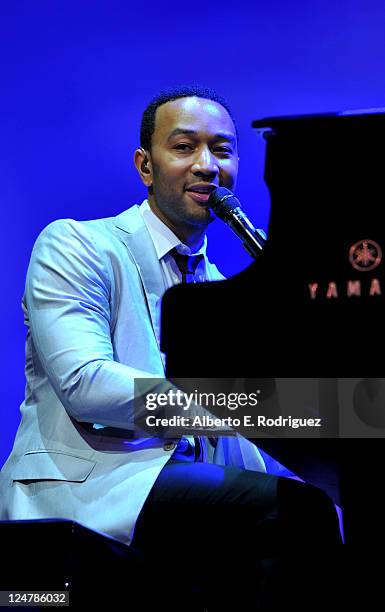 Musician John Legend performs at the Cinema Against AIDS Toronto 2011 Benefiting amfAR And Dignitas at The Carlu Theatre on September 11, 2011 in...