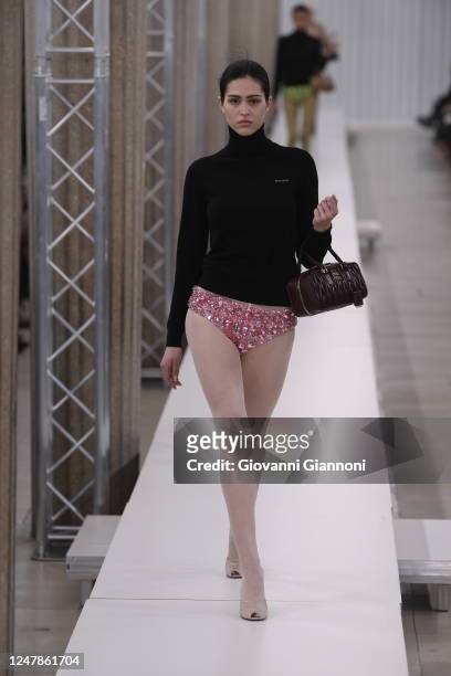Amelia Gray Hamlin on the runway at Miu Miu Fall 2023 Ready To Wear Fashion Show on March 7, 2023 at the French Economic, Social and Environmental...