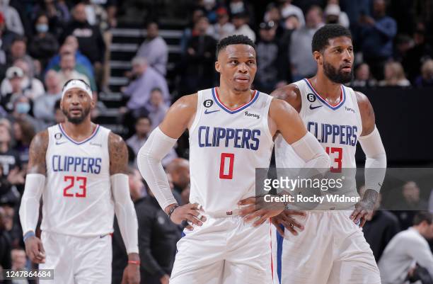 Russell Westbrook and Paul George of the Los Angeles Clippers look on during the game against the Sacramento Kings on March 3, 2023 at Golden 1...