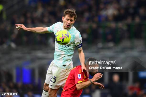Nicolo Barella of Inter Milan and Pietro Ceccaroni of US Lecce battle for the ball during the Serie A match between FC Internazionale and US Lecce at...